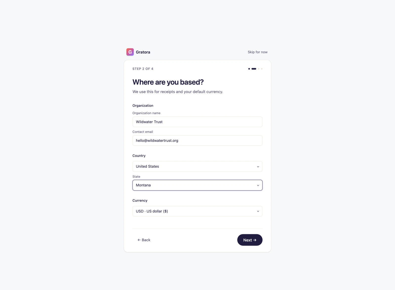 Onboarding step 2 with organization details and currency